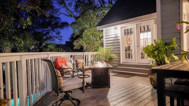 deck at night with french doors