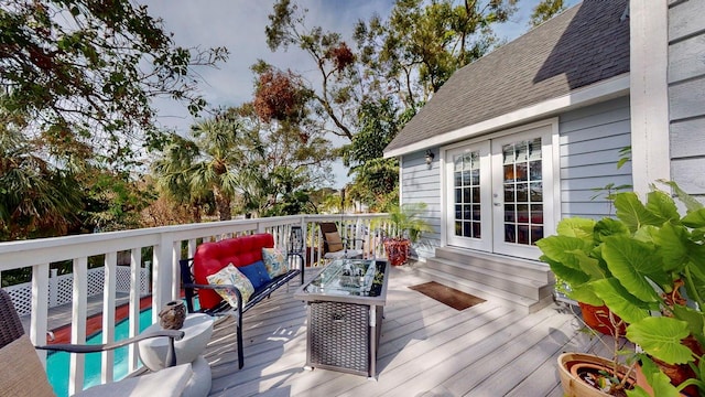 wooden terrace featuring french doors