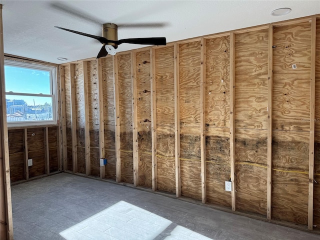 interior space featuring ceiling fan