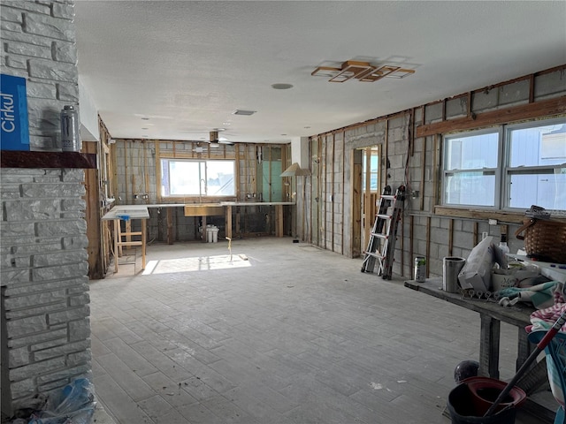 misc room featuring a textured ceiling