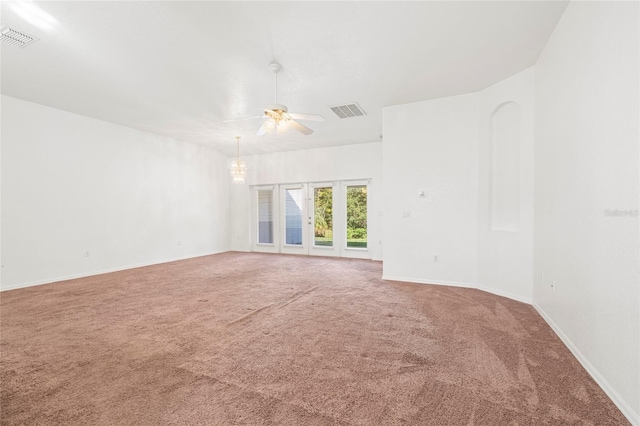 carpeted empty room with ceiling fan