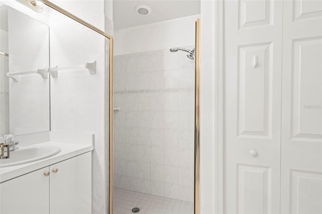 bathroom with vanity and walk in shower