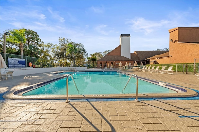 view of pool featuring a patio area