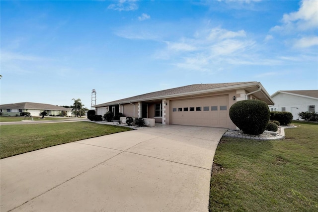 single story home featuring a garage and a front yard