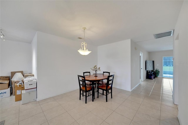 view of tiled dining space