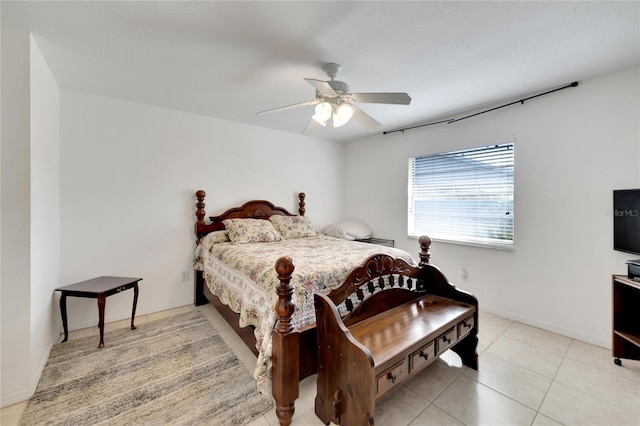 bedroom with ceiling fan and light tile patterned flooring