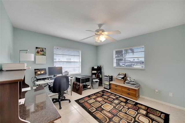 office area featuring light tile patterned floors and ceiling fan