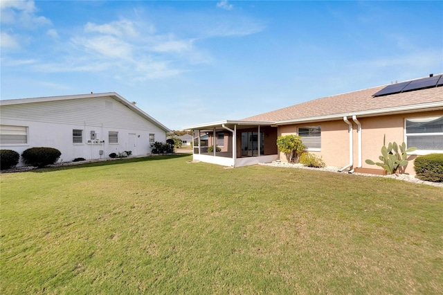 view of yard with a sunroom