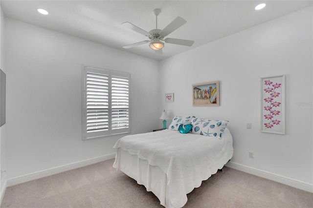 carpeted bedroom featuring ceiling fan