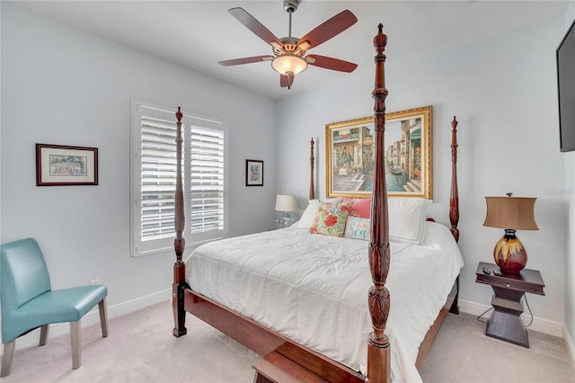 bedroom featuring light carpet and ceiling fan