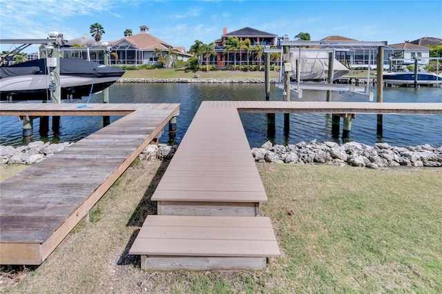 view of dock with a water view