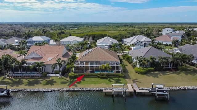 drone / aerial view with a water view