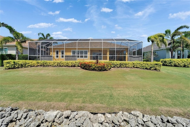 721 Manns Harbor Dr, Apollo Beach, FL 33572 - back of house with a lawn