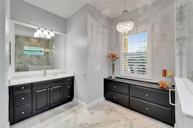 721 Manns Harbor Dr, Apollo Beach, FL 33572 - full bathroom featuring a chandelier, marble finish floors, vanity, and a walk in shower