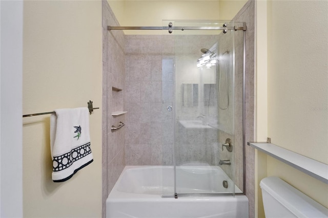 721 Manns Harbor Dr, Apollo Beach, FL 33572 - full bathroom featuring toilet and bath / shower combo with glass door