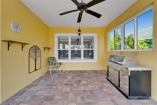 721 Manns Harbor Dr, Apollo Beach, FL 33572 - view of patio featuring a ceiling fan and exterior kitchen