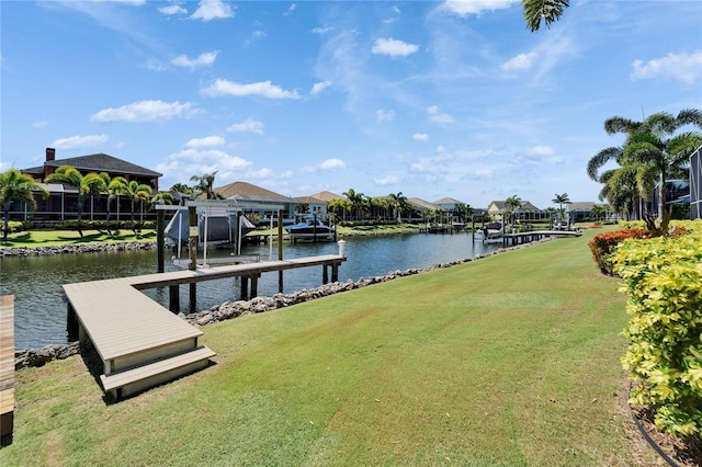 721 Manns Harbor Dr, Apollo Beach, FL 33572 - dock with a lawn, a water view, a residential view, and boat lift