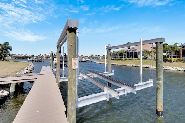 721 Manns Harbor Dr, Apollo Beach, FL 33572 - dock featuring a water view and boat lift