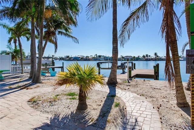 view of dock featuring a water view and boat lift