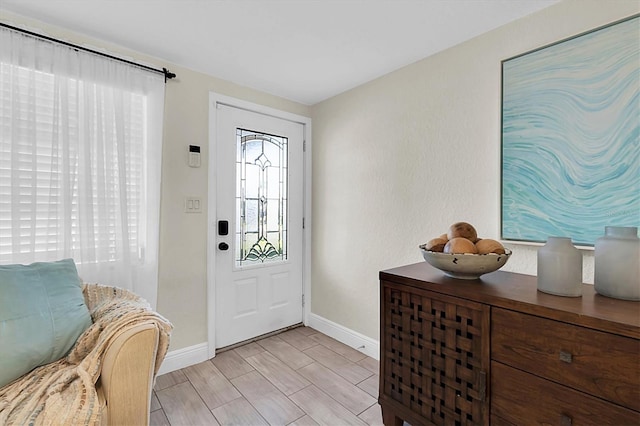 foyer with light hardwood / wood-style flooring