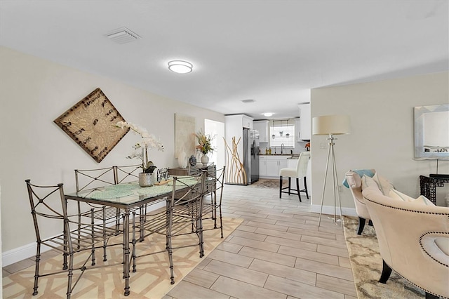 dining area featuring light hardwood / wood-style floors