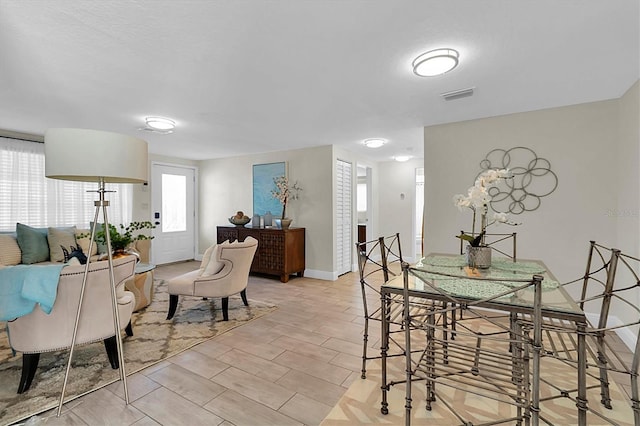 dining space featuring light hardwood / wood-style flooring