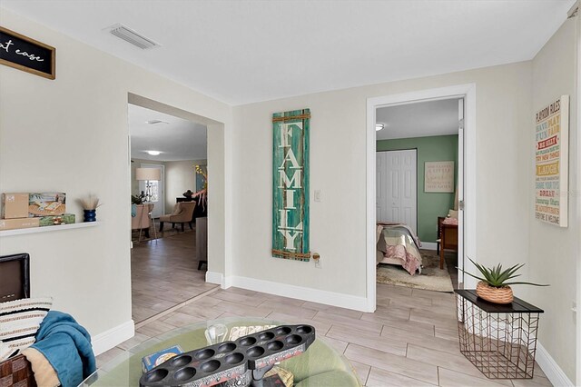 entrance foyer with light hardwood / wood-style flooring