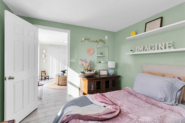 bedroom with light hardwood / wood-style flooring