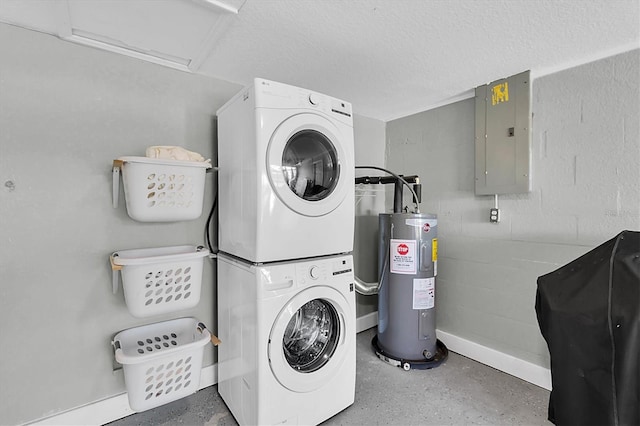 clothes washing area with a textured ceiling, electric panel, electric water heater, and stacked washer / drying machine