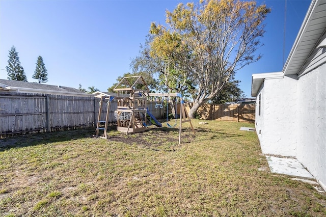 view of yard with a playground