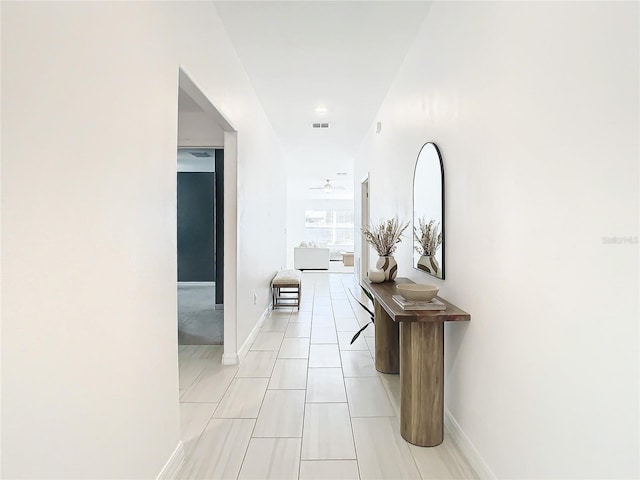 8849 Little Bluestem Dr, Land O Lakes, FL 34637 - corridor with baseboards