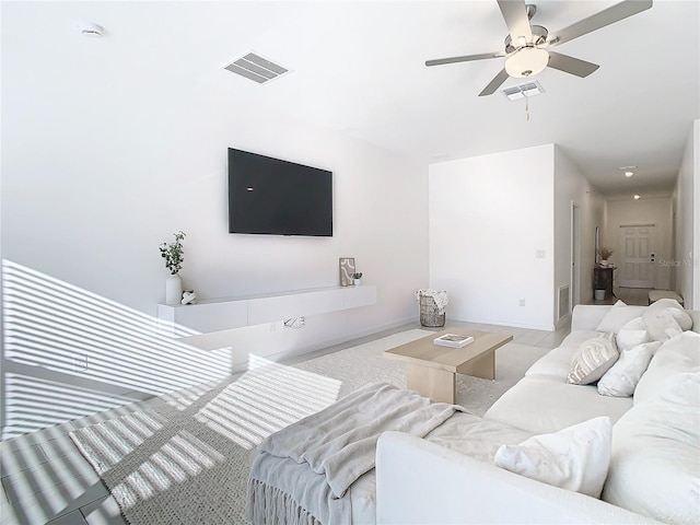 living room featuring ceiling fan