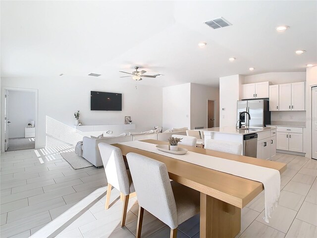 8849 Little Bluestem Dr, Land O Lakes, FL 34637 - dining room with ceiling fan and recessed lighting