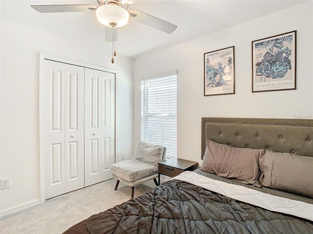8849 Little Bluestem Dr, Land O Lakes, FL 34637 - bedroom featuring carpet floors, a closet, and a ceiling fan
