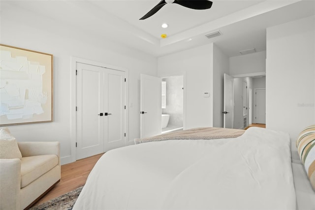 bedroom featuring ceiling fan and light wood-type flooring