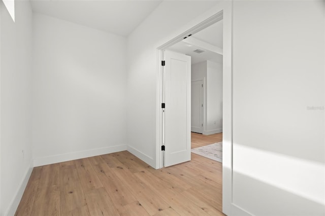 empty room featuring light hardwood / wood-style floors