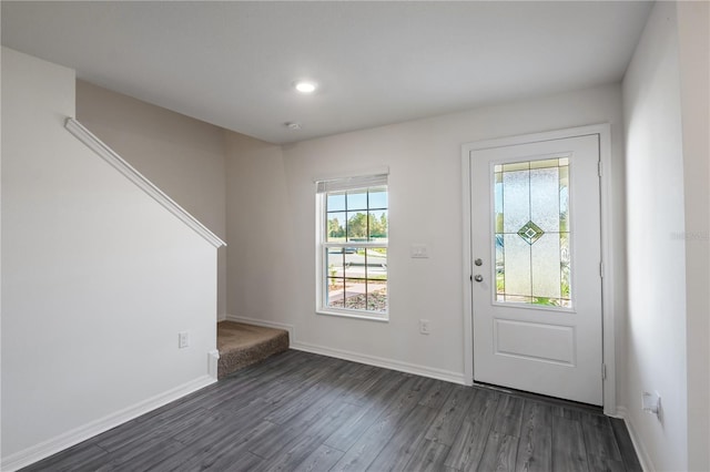 doorway to outside with dark hardwood / wood-style floors