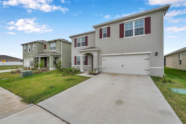 view of front of house featuring a garage and a front yard