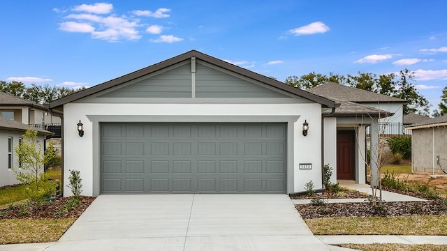 ranch-style house featuring a garage