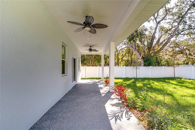 view of patio / terrace featuring ceiling fan