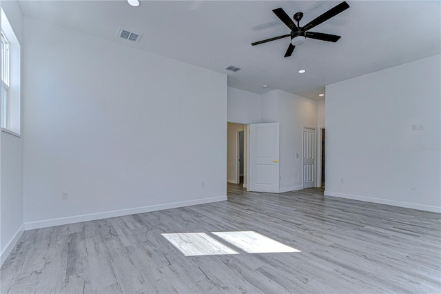 unfurnished room with ceiling fan and light hardwood / wood-style flooring