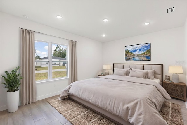 bedroom featuring light hardwood / wood-style flooring