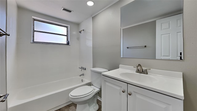 full bathroom with bathing tub / shower combination, toilet, vanity, and hardwood / wood-style flooring