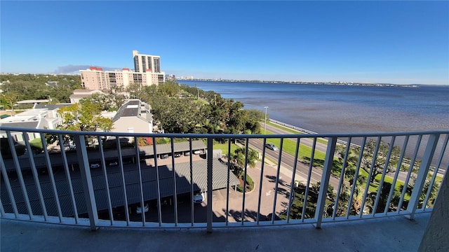 balcony featuring a water view