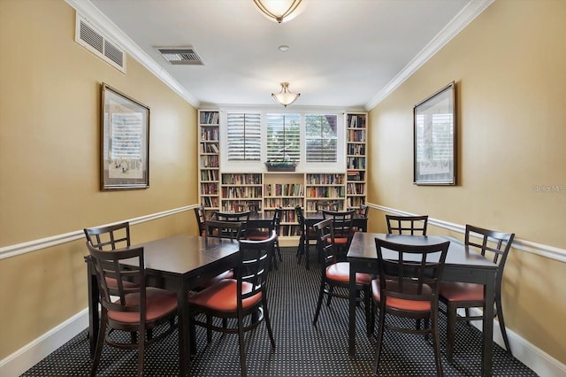 dining room with crown molding