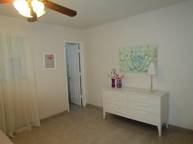 6000 20th St N Unit 114, Saint Petersburg, FL 33714 - bedroom featuring a ceiling fan