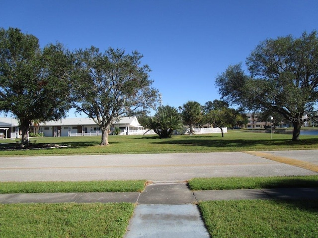 6000 20th St N Unit 114, Saint Petersburg, FL 33714 - view of asphalt road featuring sidewalks