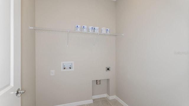 laundry area with hookup for a washing machine and hookup for an electric dryer