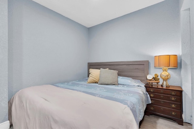 bedroom featuring light wood-type flooring