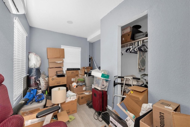 storage room featuring a wall unit AC